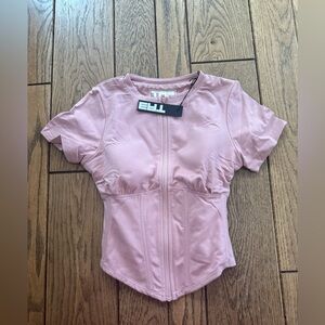 TA3 Short Sleeve Corsety in blush pink. NWT size XS